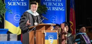 Chatt Tech President Dr. Ron Newcomb on stage at Commencement