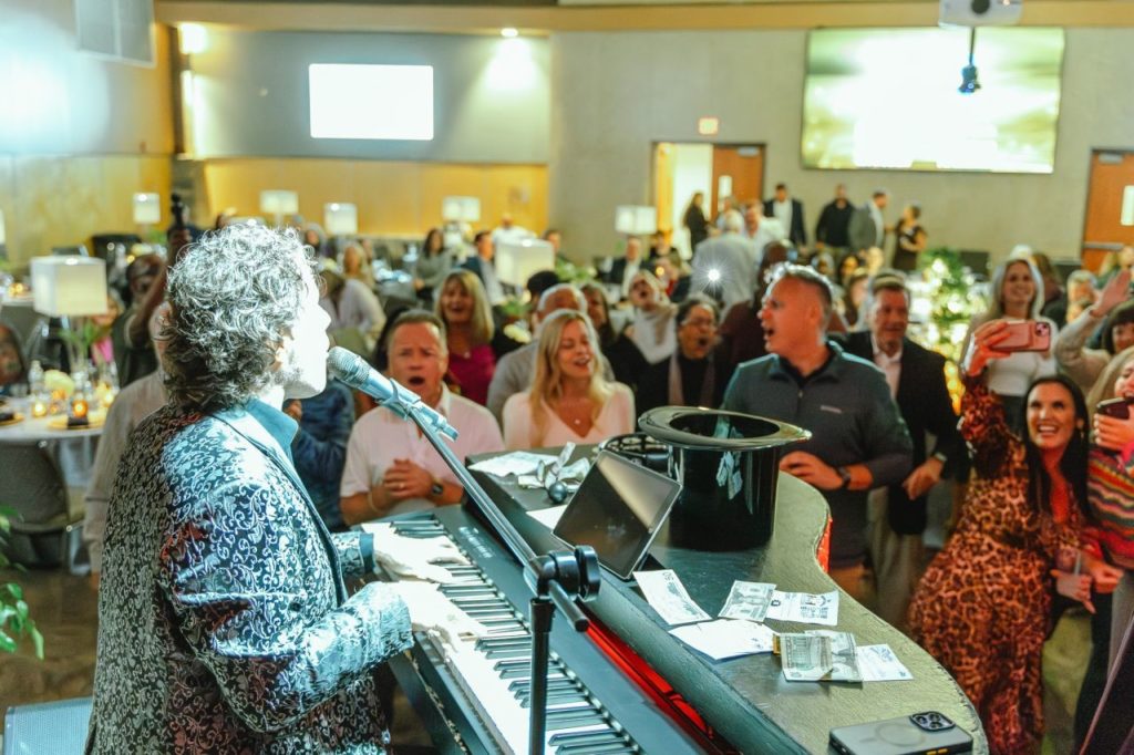 View from stage of piano player and the audience