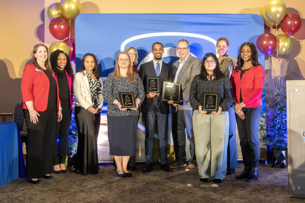 Event sponsors and the Chatt Tech Interim President are shown standing on stage with the GOAL student finalists and winner.